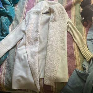 Fluffy cardigan for winter, beige color.